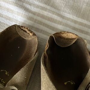 Birkenstock mules size 39 or 7 1/2 to 8 in women’s heels are a little worn
